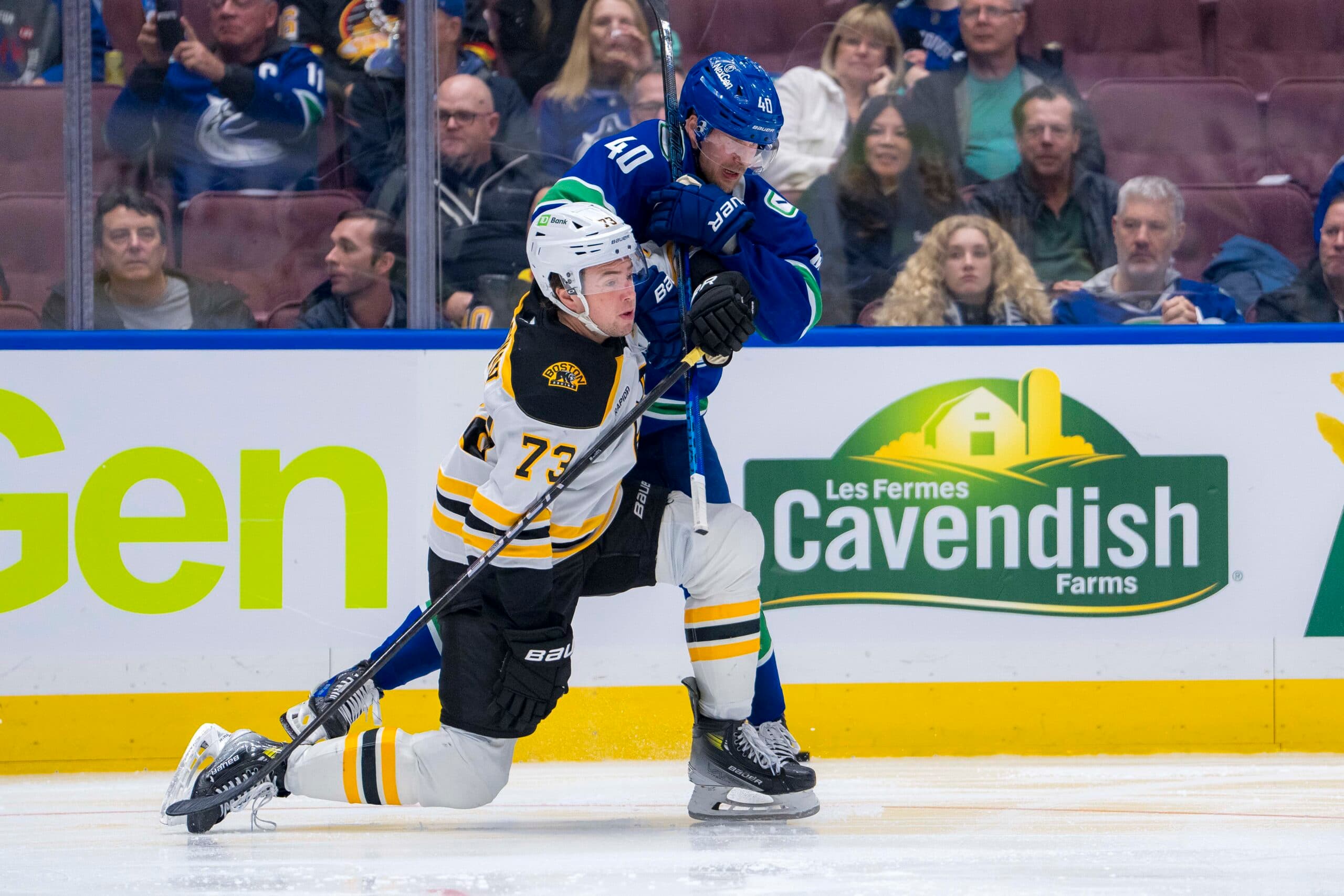 Charlie McAvoy and Elias Pettersson